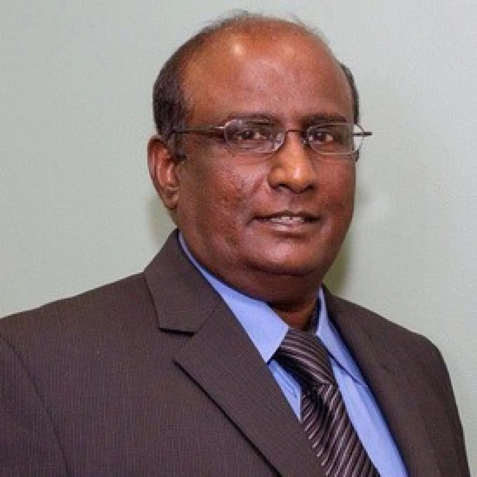 Dr. Ken Chandra